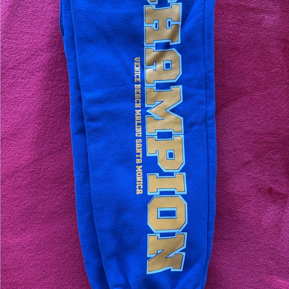 Edikted Blue Track Pants with Yellow Logo